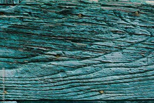 Photography Old peeling green paint texture on a fragment of a wooden fence