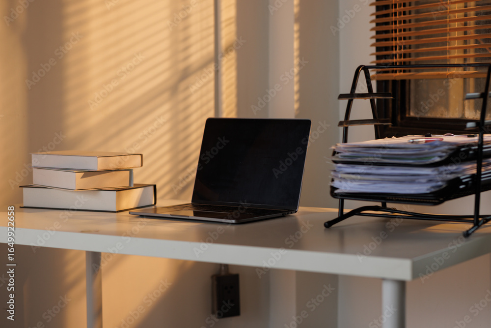 Fototapeta premium empty workplace with laptop computer, work from home concept 