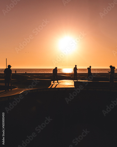 The most famous skate park on the world in Venice Beach during the sunset in Los Angeles.