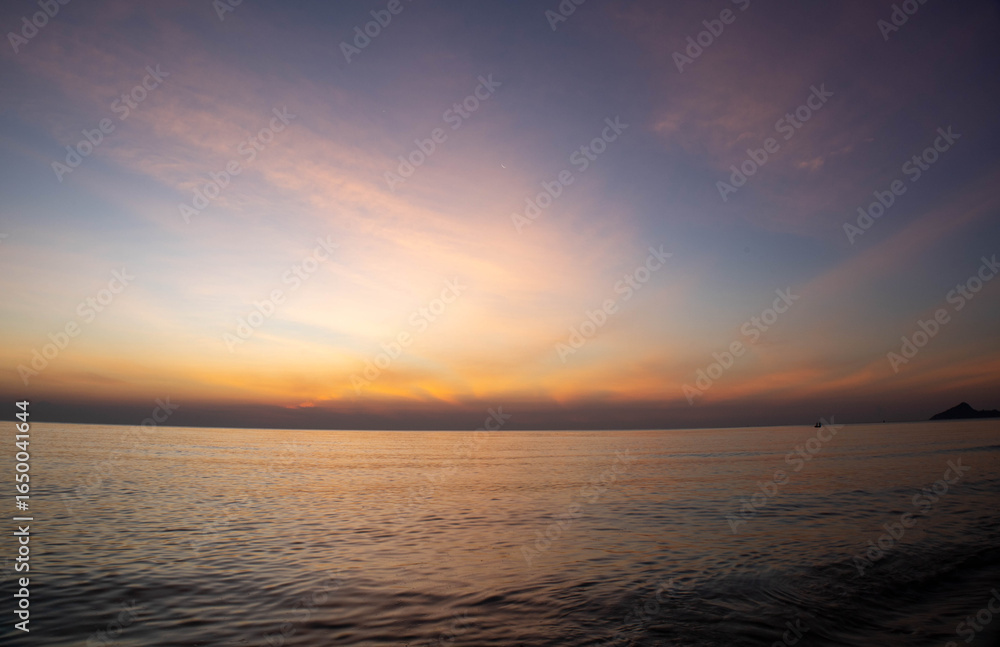 Fototapeta premium Beautiful sunset on the sea beach with coconut tree for travel in holiday