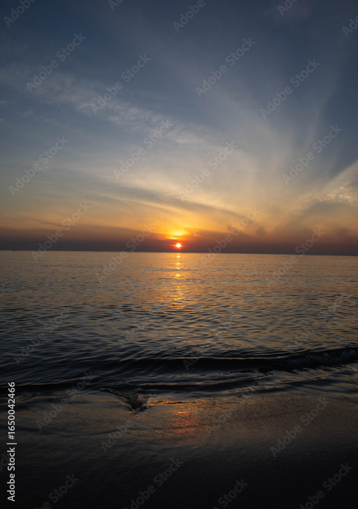 Fototapeta premium Beautiful sunset on the sea beach with coconut tree for travel in holiday