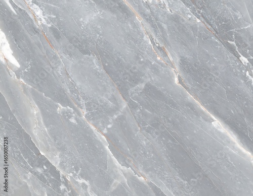 Elegant grey marble texture showcasing diagonal veins and a subtle polished surface ideal for