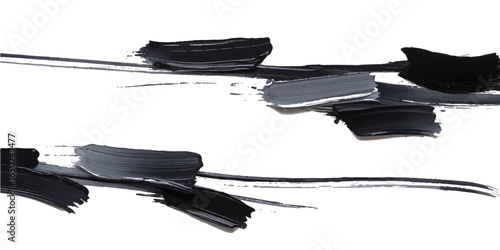 Closeup isolated black ink splashes on a metal drill bit accessory