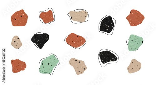 An array of abstract shapes with varied colors and textures, some outlined with thin black lines, scattered on a white background.