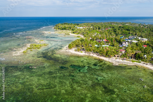 Scenic Aerial Drone Panorama picture of Cloud 9 surfing beach with waves in Siargao, Surigao den Norte, Mindanao, Philippines 