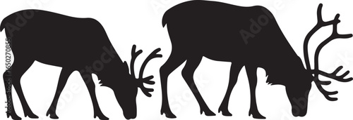 Two Black Reindeer Silhouettes Grazing on a White Background caribou animal