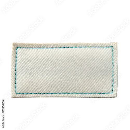 A white patch of fabric with blue and white thread. The patch is square in shape and has a blue and white border