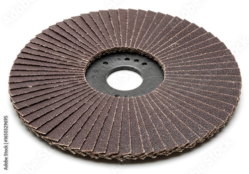 A close up of a brown flap disc sanding grinding wheel on a white background surface