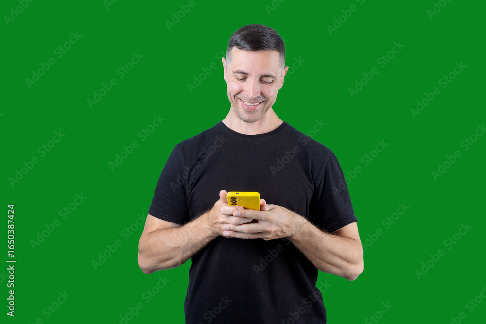 custom made wallpaper toronto digitalA man is smiling while holding a cell phone. Green isolated background