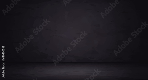 Dark, textured concrete wall and floor studio background.