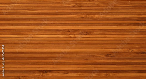 A close-up view of a bamboo wood surface, showcasing the natural grain and warm brown tones.
