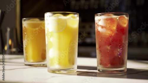 Wallpaper Mural Refreshing Drinks Trio: Diverse Colors and Flavors on Marble Countertop Torontodigital.ca