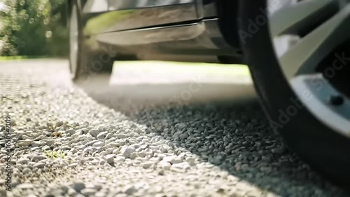 Dark car on gravel road