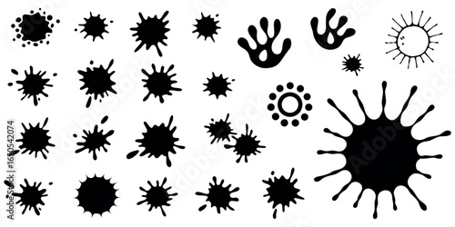 Collection of abstract black ink splatters and blots perfect for creative design projects, modern art, and stylish branding