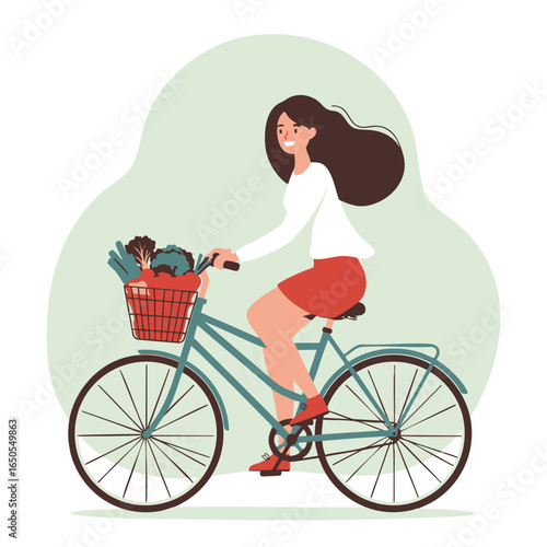 Happy Woman Riding a Bicycle with Fresh Groceries in a Basket, Healthy Lifestyle Concept