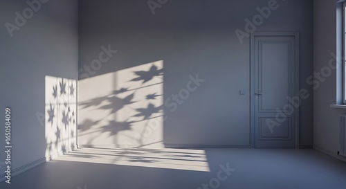 Sunlit austere room with botanical shadows creating a serene and modern ambiance