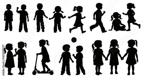 Silhouette group of children playing, running, jumping, and holding hands in joyful youthful innocence