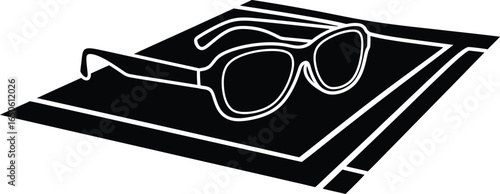 Stylish sunglasses on a book, reading and summer vacation concept