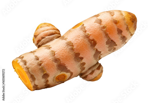 Close-up of a fresh turmeric root with natural color and texture on a black background