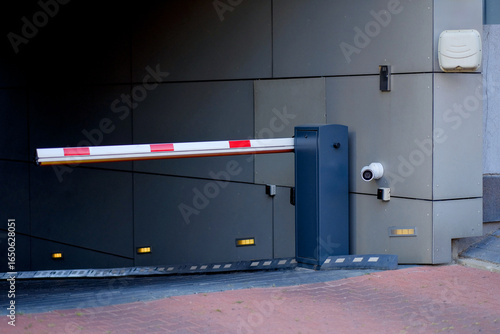 Modern Underground Parking Entrance with Automated Barrier System