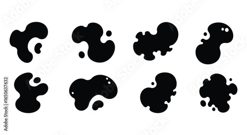 Collection of black ink blots with various textures and patterns