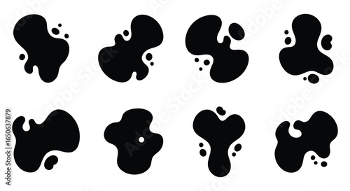 Collection of black ink splatters on white background