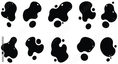 A collection of black ink blotches on a white background