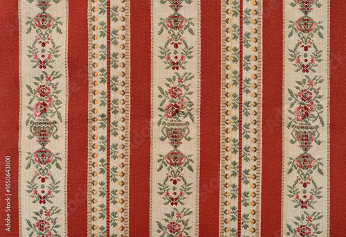 Vintage red Biedermeier striped furniture fabric. Vintage Biedermeier upholstery fabric. Top view.