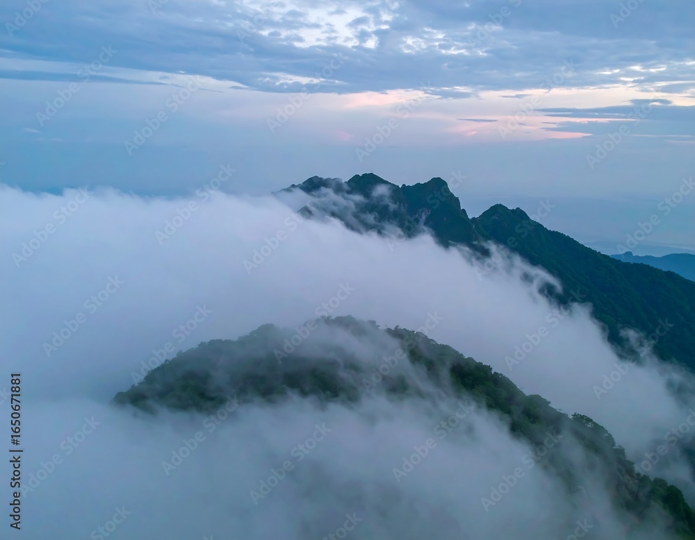 Fototapeta premium Misty mountain peaks