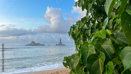 View of Vivekananda Rock and Thiruvalluvar Statue off Kanyakumari coast, Tamil Nadu, India, where the Bay of Bengal, Arabian Sea, and Indian Ocean meet, iconic cultural landmarks.