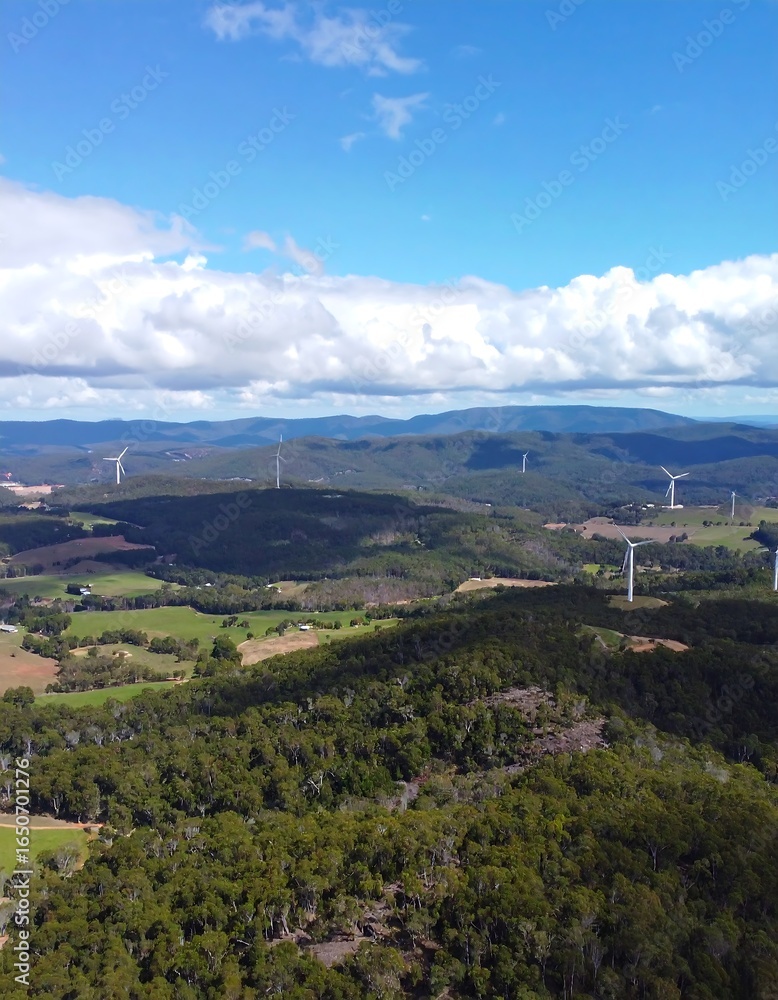 Naklejka premium Scenic wind farm nestled in valley