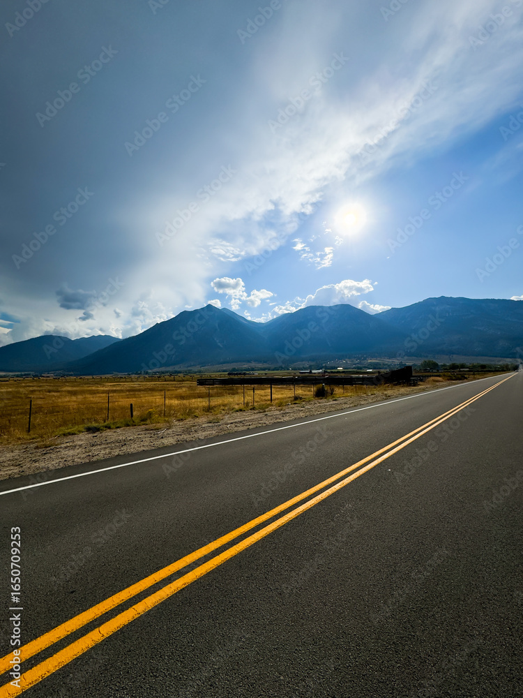 Naklejka premium Mountains and Empty scenic highway in Nevada, USA. High quality photo