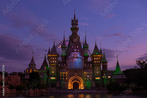 Photos Fairy-tale style illuminated castle at dusk