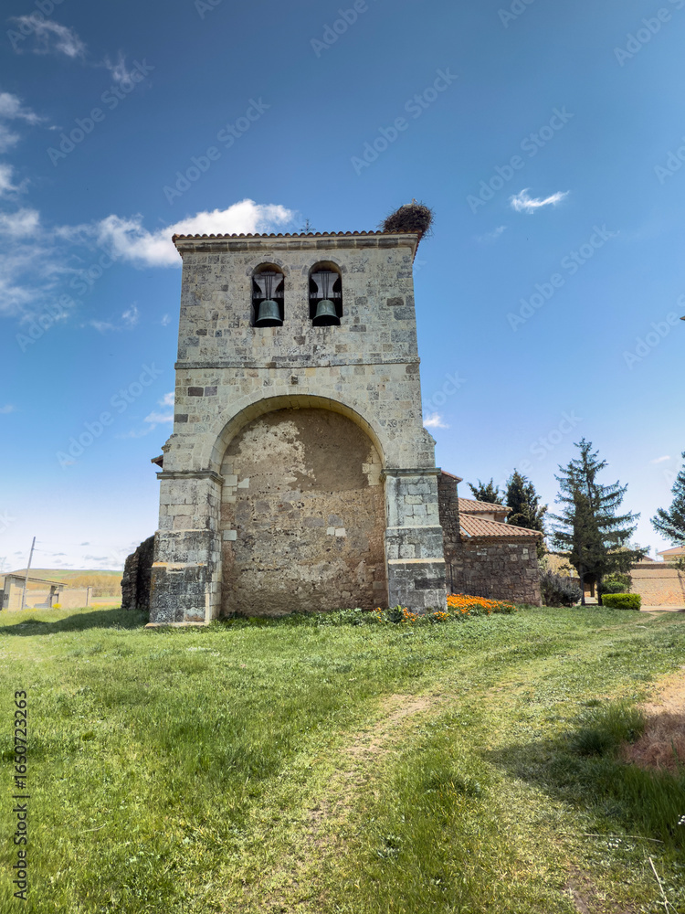 Fototapeta premium Nuestra Sra de las Candelas Church in Calahorra de Boedo, Palencia, with stork nest