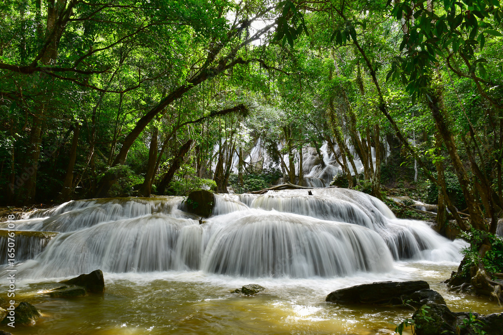 Obraz premium Pha Tad Waterfall in the forest at Kanchanaburi,Thailand.