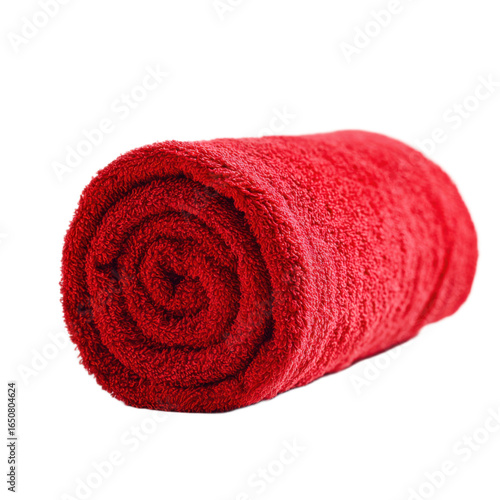 Red towel is rolled up on a white surface