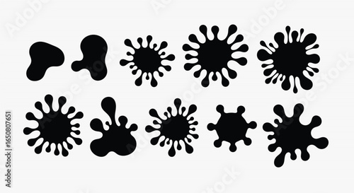 Vector art of collection of black ink blot shapes isolated on white background for design use