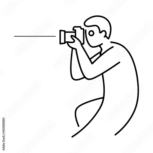 Nature and Event Photography: A person taking a low-angle shot, which can be used for fields such as event, sports, or wildlife photography.