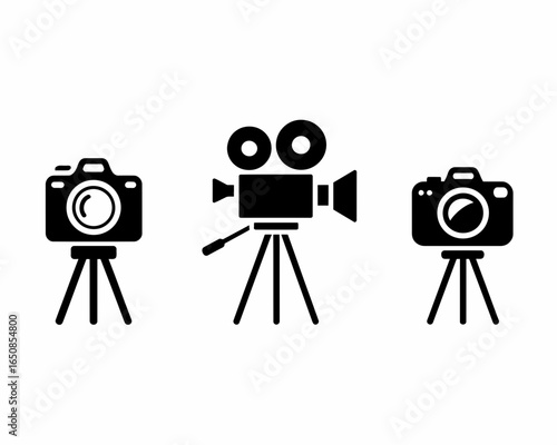 Three black silhouette cameras on tripods isolated on white background silhouette