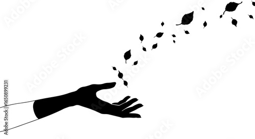 Black silhouette hand releasing leaves on white background with copy space