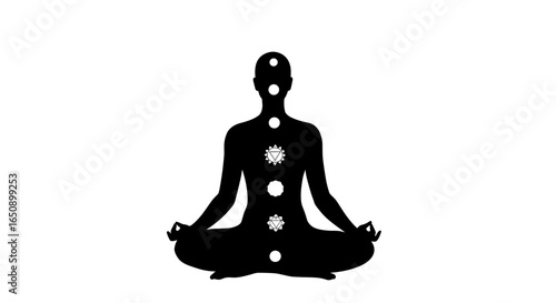 Black silhouette of a meditating person with glowing chakras on white background with copy space