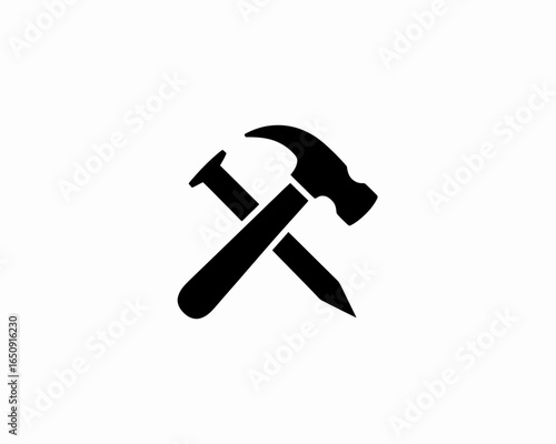 Hammer and nail silhouette crossed together isolated on white background