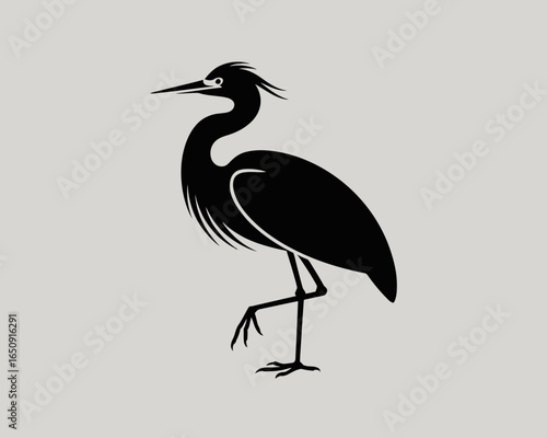 Elegant heron silhouette standing on one leg isolated on white background