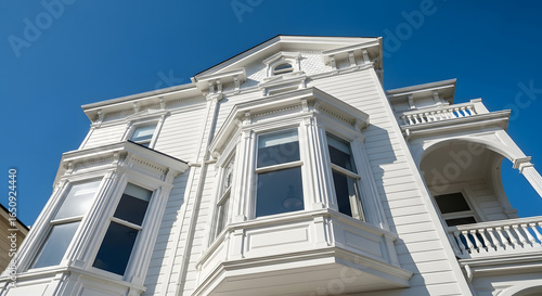 Wallpaper Mural Victorian white house facade against clear blue sky Torontodigital.ca