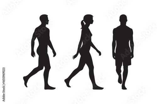 Silhouettes of people walking in different directions