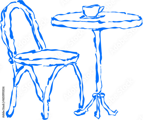 Table with cup and single chair