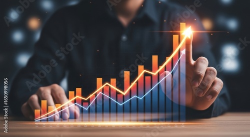 Person pointing at a rising growth chart showing business success and financial progress