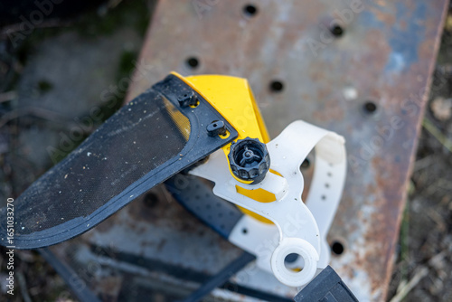 Wallpaper Mural A protective face shield with a mesh screen for gardening or forestry. Torontodigital.ca