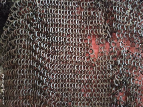 Chain mail texture. Old chain mail. Rusty texture of rings. Knights' clothing. Museum
