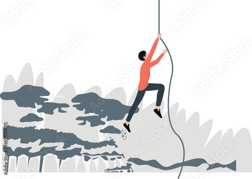 A boy is crossing a ditch hanging on a rope.